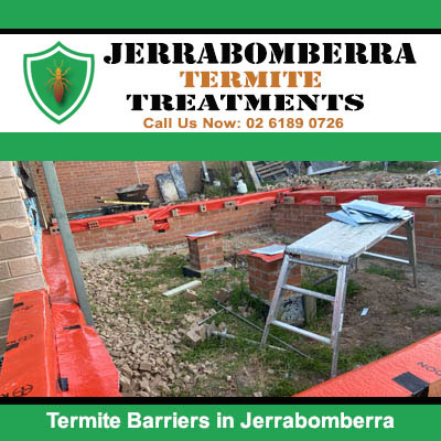 Orange termite barrier framework on brick in Jerrabomberra