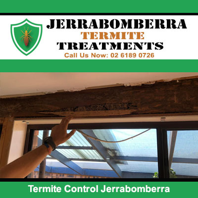 Termite control on wooden beam above window in Jerrabomberra